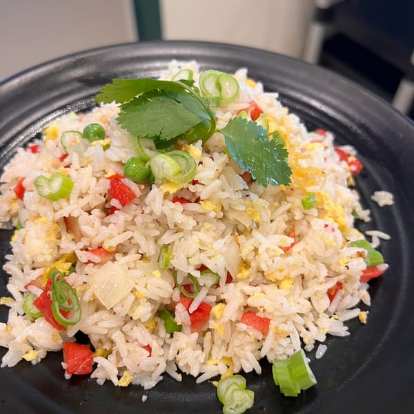 Imperial Garden's fried rice with peas, red peppers, scrambled egg, green onions, and cilantro.
